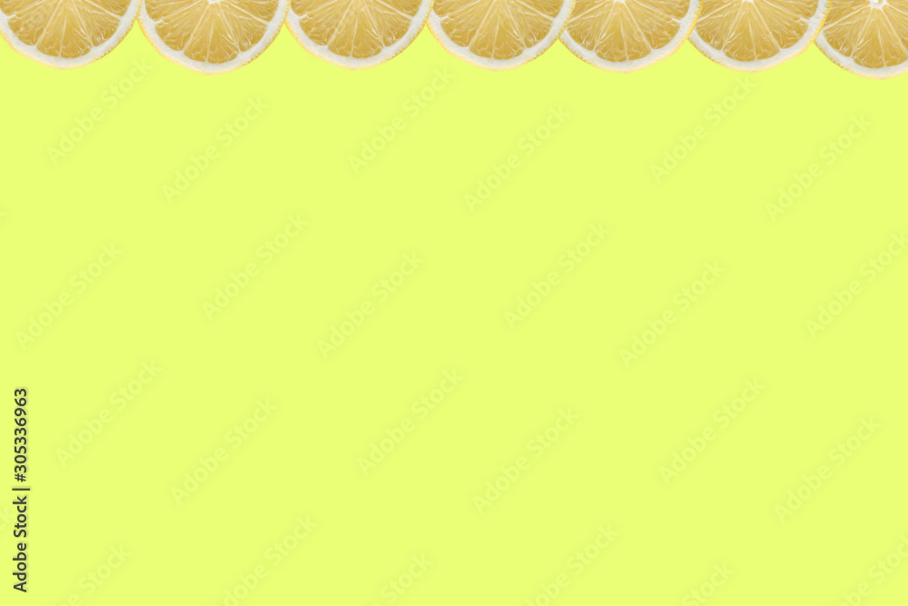 Wall mural lemon fruits pattern on yellow background