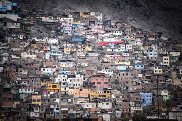 Lima, Peru - Nov 19, 2019: Colorful buildings on the slopes of Cerro San Cristobal, Rimac