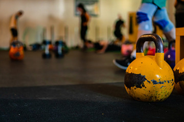 Naklejka na ściany i meble Kettlebells on gym. Close up. Work out with the kettlebells