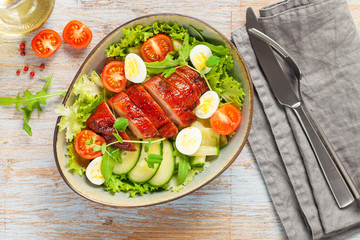 Chicken meat and vegetables salad.