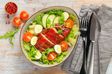 Chicken meat and vegetables salad.