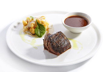 Filet mignon steak with cauliflower dish