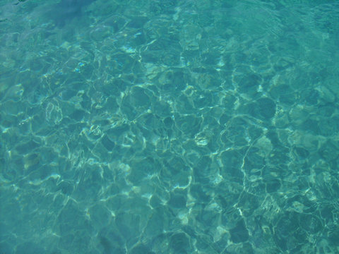sea background in milos island in greece, kleftiko bay rock caves, sea swimming sailing in summer holidays