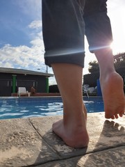 legs of woman on beach