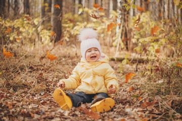 child funs in the woods. autumn park. The concept of fashion, accessories, outdoor walks