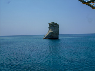 milos island in greece, kleftiko bay rock caves, sea swimming sailing in summer holidays