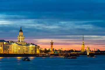 Obraz premium Saint Petersburg. Russia. White night. Vasilievsky island. Petropavlovskaya fortress. Pleasure ships on the Neva. Rivers Of Petersburg. Sights Of St. Petersburg. Summer trip to Russia.
