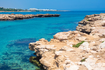 Cyprus. Protaras. Pernera. Mediterranean landscape. Rocky coast of the Mediterranean sea. Clean sea water. Beach holiday. Seaside resort. Holidays in Cyprus.