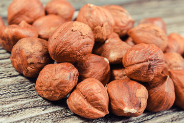 Hazelnuts as source minerals and fiber. Wooden background