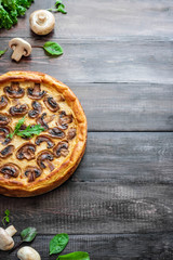 Jellied pie with meat and mushrooms on potato dough