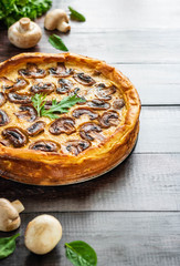 Jellied pie with meat and mushrooms on potato dough