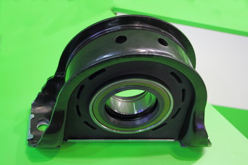 Car cardan shaft intermediate bearing support holder close up, vehicle transmission repair