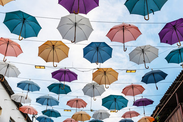 background of colored opened umbrellas