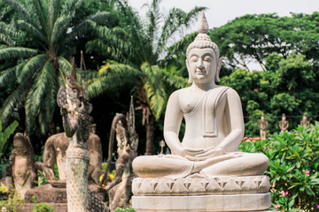 Buddha statue according to the Buddhist and Hindu beliefs. Located at the Buddha's Garden, Vientiane, Laos.