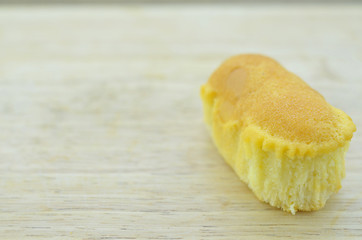 Delicious bread on a wooden background. Single