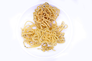 South Indian Homemade Murukku isolated on white with copy space / Diwali snacks