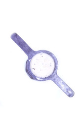 Close up of traditional Indian Asian Sev or Murukku maker with Rice powder isolated on white.