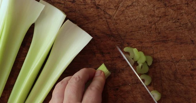 Cutting celery stalk in slices