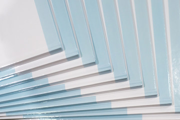 Stack of books with a blue hard cover. Composition from books