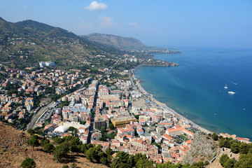 Fototapeta na wymiar View of Cefalu town from the Rocca di Cefalu in the morning. Sicily, Italy