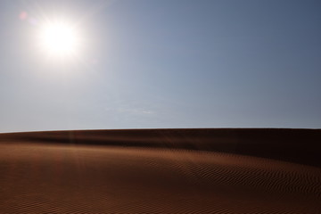 Bright sun and a desert landscape. Hot Climate  