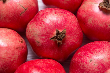 Group of red garnets on wooden background