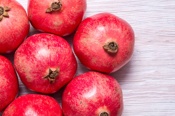 Group of red garnets on wooden background