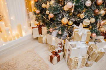 Christmas background with new year tree and different gift boxes, holiday background