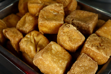Pile of freshly fried tofu