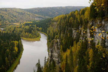 High cliffs next to a beautiful river in autumn
