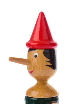 Moscow, Russia - January 23, 2018: Souvenir Toy Pinocchio - symbol of Italy -  isolated on white background