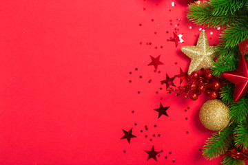 Christmas holidays composition on red background with copy space for your text