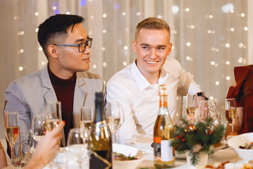 Friends at holiday table.