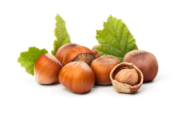 Hazelnut nut many leaves isolated on a white background as a packaging design element