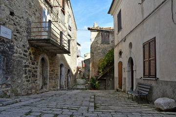 Civitanova del Sannio, 11/23/2019. A narrow street among the old houses of a mountain village in the Molise region