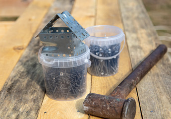 Nails and screws on a construction site