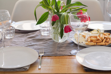 served festive table with flowers