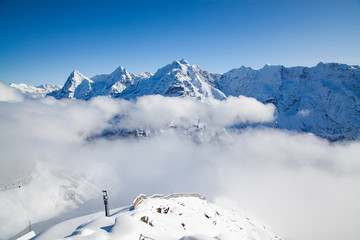 amazing snow covered peaks in the Swiss alps Jungfrau region from Schilthorn