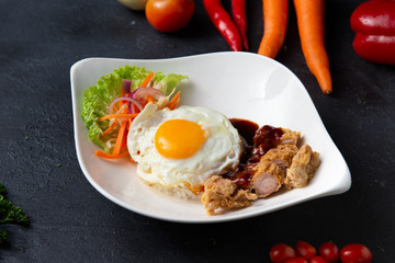 Fototapeta na wymiar penang loh bak , spicy pork rolls with egg and rice