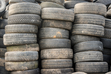 Used  tires pile in the tire repair shop yard