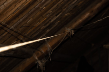 Obraz premium Rope on the roof of old attic