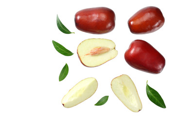 fresh date fruit with sleces and leaves isolated on white background. top view