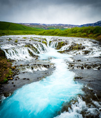 Fototapeta na wymiar Blue Bruarfoss waterfalls in iceland