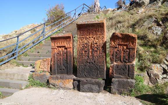 Group of Old Khachkar (Armenian Cross-stones) beside the stairs up to Sevanavank Monastery, Sevan Peninsula in Armenia 