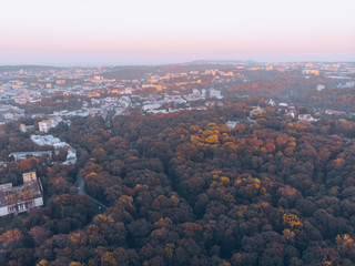 aerial view of autumn city park on sunset