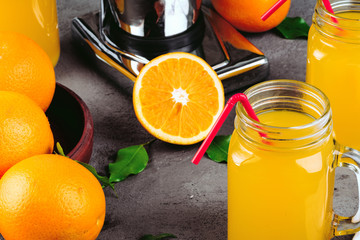 Orange juicer apparatus on kitchen table close up
