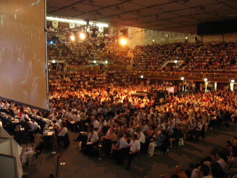 Crowd Of People In Conference Hall