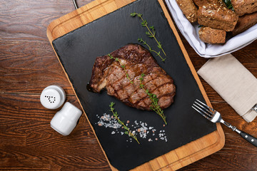 Beef steak on a blackboard