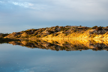 Sunrise reflections on the Onkaparinga River in Port Noarlunga South Australia on 25th November 2019