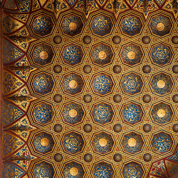 Golden floral pattern decorations, part of ceiling of Mausoleum of Sultan Qalawun, Sultan Qalawun Complex, located in Muizz Street, Gamalia district, Cairo, Egypt